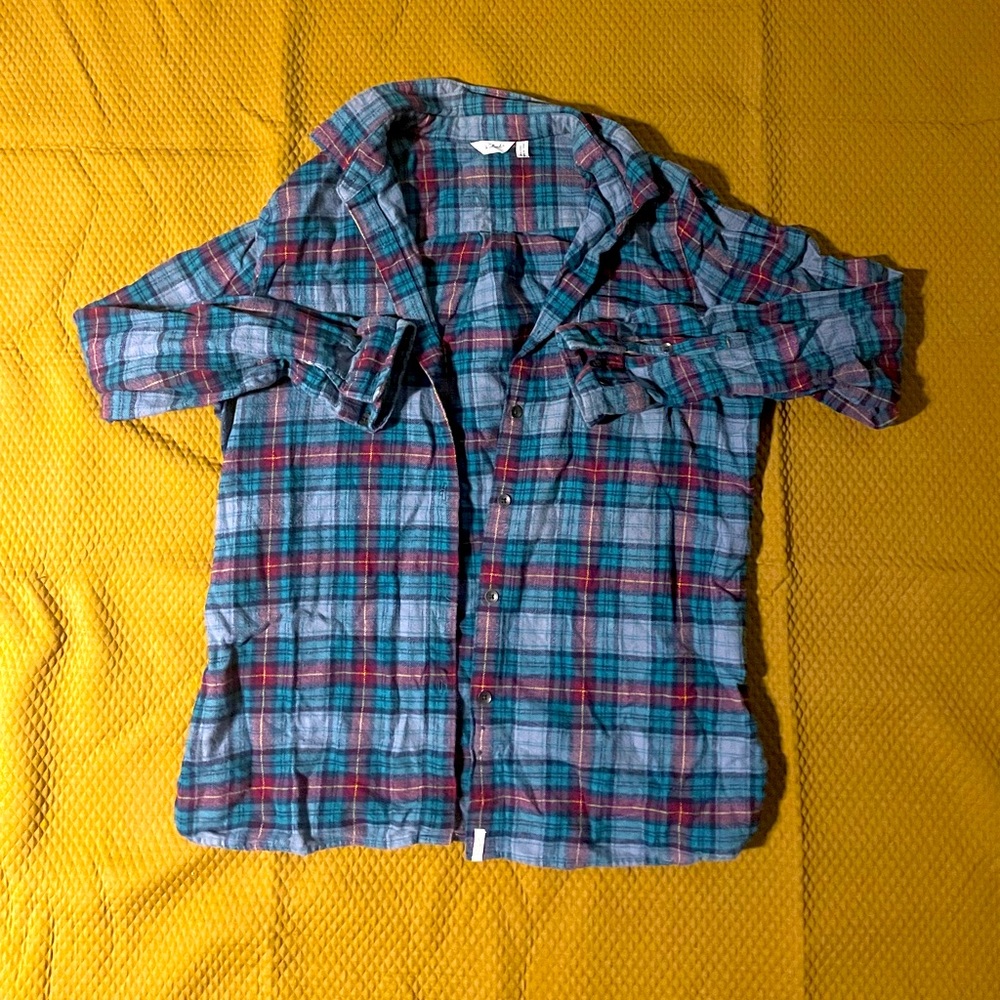 Woolrich flannel. Size large fits like a medium.